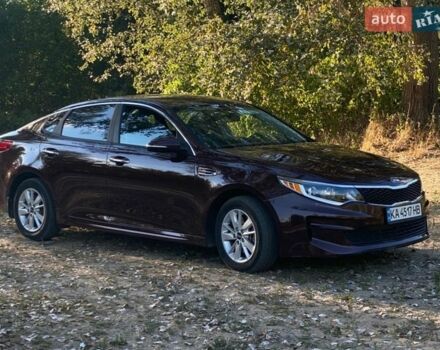 Красный Киа Оптима, объемом двигателя 2.4 л и пробегом 223 тыс. км за 10200 $, фото 1 на Automoto.ua