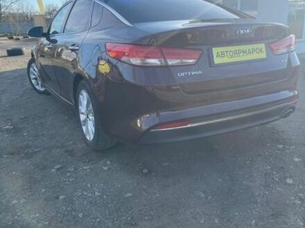 Красный Киа Оптима, объемом двигателя 2.4 л и пробегом 148 тыс. км за 12490 $, фото 1 на Automoto.ua