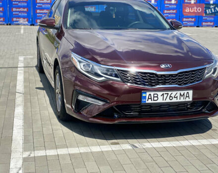 Красный Киа Оптима, объемом двигателя 2.36 л и пробегом 107 тыс. км за 13600 $, фото 1 на Automoto.ua