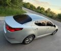 Сірий Кіа Оптіма, об'ємом двигуна 2 л та пробігом 230 тис. км за 10062 $, фото 1 на Automoto.ua