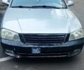 Серый Киа Оптима, объемом двигателя 2 л и пробегом 420 тыс. км за 2001 $, фото 1 на Automoto.ua