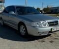 Серый Киа Оптима, объемом двигателя 2 л и пробегом 54 тыс. км за 5400 $, фото 1 на Automoto.ua