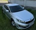Серый Киа Оптима, объемом двигателя 2 л и пробегом 230 тыс. км за 7900 $, фото 1 на Automoto.ua