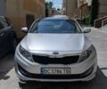 Серый Киа Оптима, объемом двигателя 2 л и пробегом 217 тыс. км за 8199 $, фото 1 на Automoto.ua