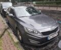 Сірий Кіа Оптіма, об'ємом двигуна 2 л та пробігом 205 тис. км за 10500 $, фото 1 на Automoto.ua