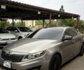 Сірий Кіа Оптіма, об'ємом двигуна 2 л та пробігом 251 тис. км за 10000 $, фото 1 на Automoto.ua