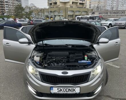 Серый Киа Оптима, объемом двигателя 2 л и пробегом 243 тыс. км за 10500 $, фото 11 на Automoto.ua