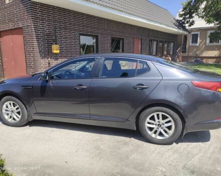 Серый Киа Оптима, объемом двигателя 2 л и пробегом 150 тыс. км за 10000 $, фото 2 на Automoto.ua