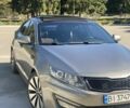 Сірий Кіа Оптіма, об'ємом двигуна 2 л та пробігом 165 тис. км за 10400 $, фото 1 на Automoto.ua