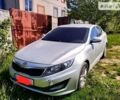 Сірий Кіа Оптіма, об'ємом двигуна 2 л та пробігом 240 тис. км за 8500 $, фото 1 на Automoto.ua