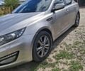 Сірий Кіа Оптіма, об'ємом двигуна 2 л та пробігом 265 тис. км за 9303 $, фото 1 на Automoto.ua