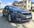 Серый Киа Оптима, объемом двигателя 2 л и пробегом 175 тыс. км за 10200 $, фото 1 на Automoto.ua
