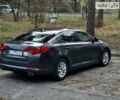 Сірий Кіа Оптіма, об'ємом двигуна 2.36 л та пробігом 132 тис. км за 8850 $, фото 1 на Automoto.ua