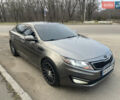 Серый Киа Оптима, объемом двигателя 2 л и пробегом 180 тыс. км за 9300 $, фото 2 на Automoto.ua