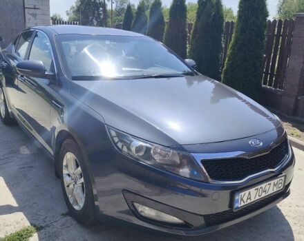 Серый Киа Оптима, объемом двигателя 2 л и пробегом 150 тыс. км за 10000 $, фото 1 на Automoto.ua