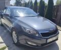 Серый Киа Оптима, объемом двигателя 2 л и пробегом 150 тыс. км за 10000 $, фото 1 на Automoto.ua