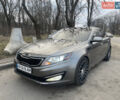 Сірий Кіа Оптіма, об'ємом двигуна 2 л та пробігом 150 тис. км за 9500 $, фото 1 на Automoto.ua