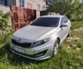Сірий Кіа Оптіма, об'ємом двигуна 2 л та пробігом 248 тис. км за 7500 $, фото 1 на Automoto.ua