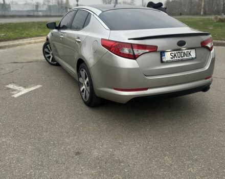 Серый Киа Оптима, объемом двигателя 2 л и пробегом 243 тыс. км за 10500 $, фото 2 на Automoto.ua