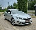 Сірий Кіа Оптіма, об'ємом двигуна 2 л та пробігом 231 тис. км за 8900 $, фото 1 на Automoto.ua