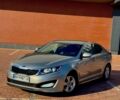 Серый Киа Оптима, объемом двигателя 2 л и пробегом 215 тыс. км за 10200 $, фото 1 на Automoto.ua