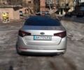Сірий Кіа Оптіма, об'ємом двигуна 2 л та пробігом 150 тис. км за 10999 $, фото 5 на Automoto.ua