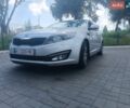 Серый Киа Оптима, объемом двигателя 2 л и пробегом 174 тыс. км за 10250 $, фото 1 на Automoto.ua