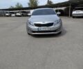 Сірий Кіа Оптіма, об'ємом двигуна 2 л та пробігом 121 тис. км за 10800 $, фото 1 на Automoto.ua