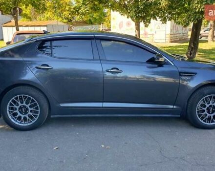 Серый Киа Оптима, объемом двигателя 2 л и пробегом 210 тыс. км за 12700 $, фото 8 на Automoto.ua