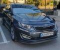 Серый Киа Оптима, объемом двигателя 2 л и пробегом 210 тыс. км за 12700 $, фото 1 на Automoto.ua