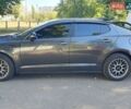 Сірий Кіа Оптіма, об'ємом двигуна 2 л та пробігом 215 тис. км за 10700 $, фото 4 на Automoto.ua