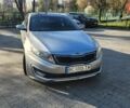 Сірий Кіа Оптіма, об'ємом двигуна 2.36 л та пробігом 200 тис. км за 10500 $, фото 1 на Automoto.ua