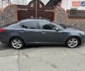 Серый Киа Оптима, объемом двигателя 2 л и пробегом 211 тыс. км за 10200 $, фото 1 на Automoto.ua