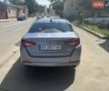 Сірий Кіа Оптіма, об'ємом двигуна 2.36 л та пробігом 320 тис. км за 6500 $, фото 4 на Automoto.ua