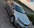 Сірий Кіа Оптіма, об'ємом двигуна 2.4 л та пробігом 210 тис. км за 10500 $, фото 1 на Automoto.ua