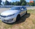 Серый Киа Оптима, объемом двигателя 2 л и пробегом 250 тыс. км за 7900 $, фото 1 на Automoto.ua
