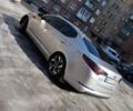 Сірий Кіа Оптіма, об'ємом двигуна 2 л та пробігом 150 тис. км за 10999 $, фото 7 на Automoto.ua