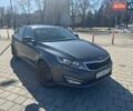 Серый Киа Оптима, объемом двигателя 2 л и пробегом 365 тыс. км за 8000 $, фото 1 на Automoto.ua