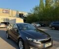 Сірий Кіа Оптіма, об'ємом двигуна 2 л та пробігом 214 тис. км за 10500 $, фото 1 на Automoto.ua