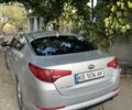 Серый Киа Оптима, объемом двигателя 2.4 л и пробегом 250 тыс. км за 9500 $, фото 3 на Automoto.ua