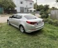 Серый Киа Оптима, объемом двигателя 2 л и пробегом 280 тыс. км за 7500 $, фото 1 на Automoto.ua