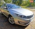 Серый Киа Оптима, объемом двигателя 2 л и пробегом 105 тыс. км за 10650 $, фото 1 на Automoto.ua