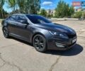 Сірий Кіа Оптіма, об'ємом двигуна 2 л та пробігом 200 тис. км за 10999 $, фото 2 на Automoto.ua