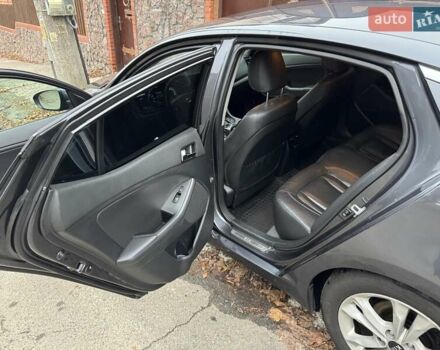 Серый Киа Оптима, объемом двигателя 2 л и пробегом 211 тыс. км за 10200 $, фото 7 на Automoto.ua