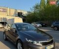 Серый Киа Оптима, объемом двигателя 2 л и пробегом 214 тыс. км за 10500 $, фото 1 на Automoto.ua