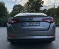 Серый Киа Оптима, объемом двигателя 2 л и пробегом 166 тыс. км за 10000 $, фото 6 на Automoto.ua