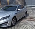 Сірий Кіа Оптіма, об'ємом двигуна 2 л та пробігом 211 тис. км за 8100 $, фото 1 на Automoto.ua