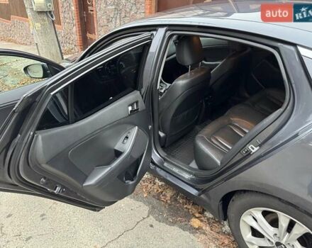 Сірий Кіа Оптіма, об'ємом двигуна 2 л та пробігом 211 тис. км за 10000 $, фото 6 на Automoto.ua
