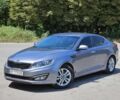 Серый Киа Оптима, объемом двигателя 2 л и пробегом 215 тыс. км за 9900 $, фото 1 на Automoto.ua