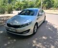 Серый Киа Оптима, объемом двигателя 2 л и пробегом 299 тыс. км за 7007 $, фото 1 на Automoto.ua